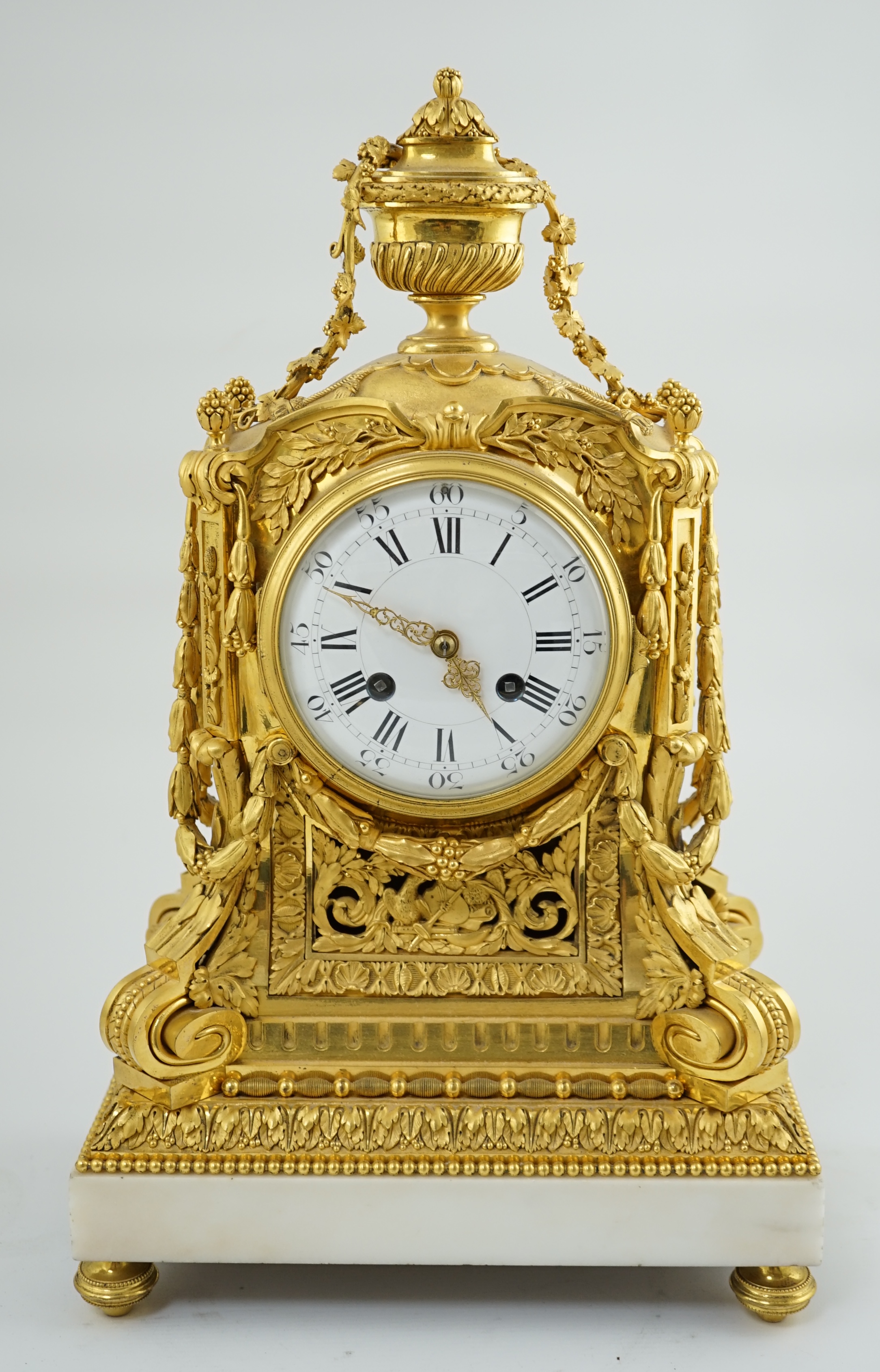 Roblin & Fils à Paris. A 19th century French Louis XV style ormolu and white marble mantel clock